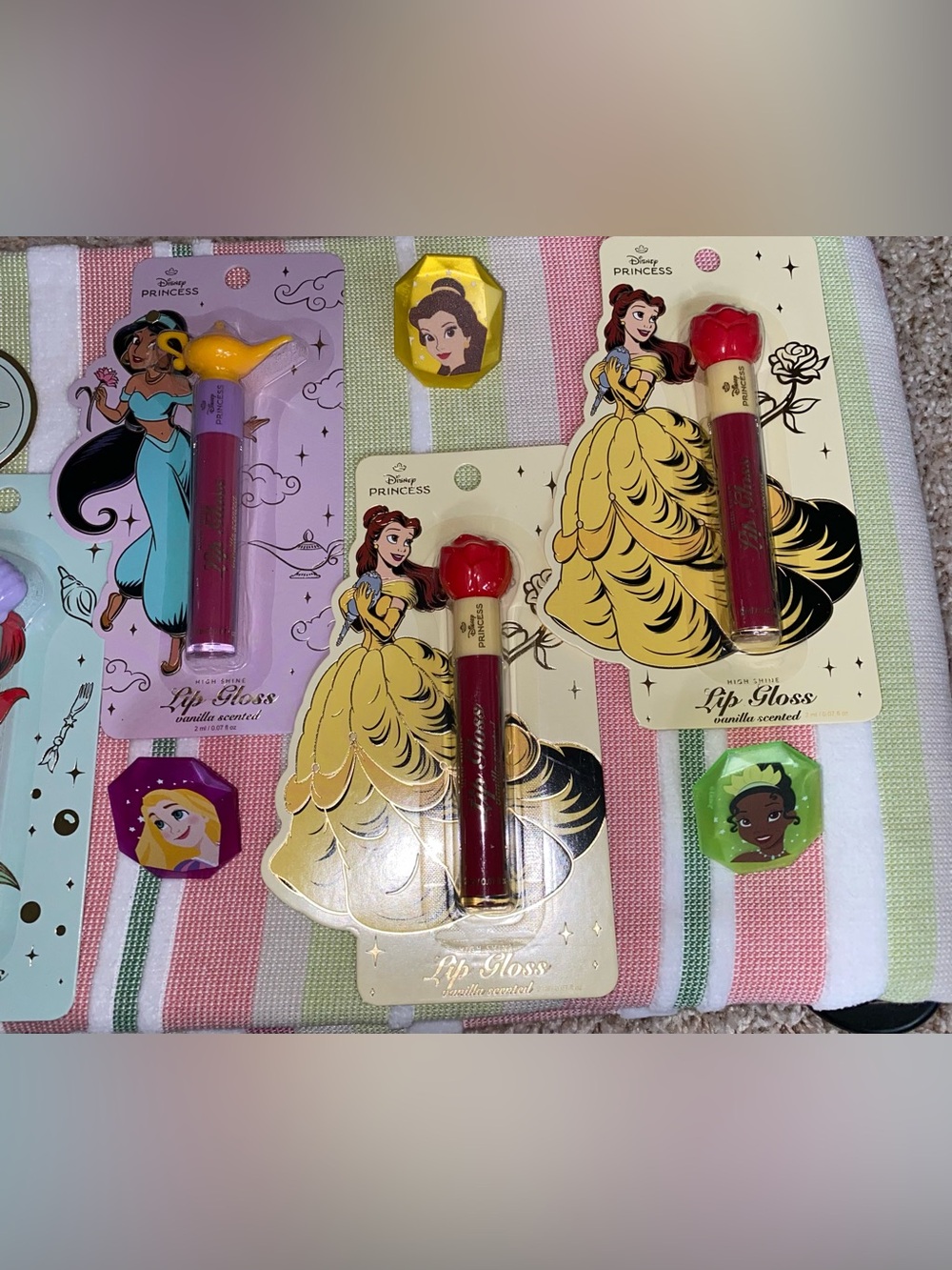 TOTALLING 18 ITEMS/ Disney Princess Bundle. 8 LIP GLOSS/9 RINGS/ 2 PACK LIP BALM